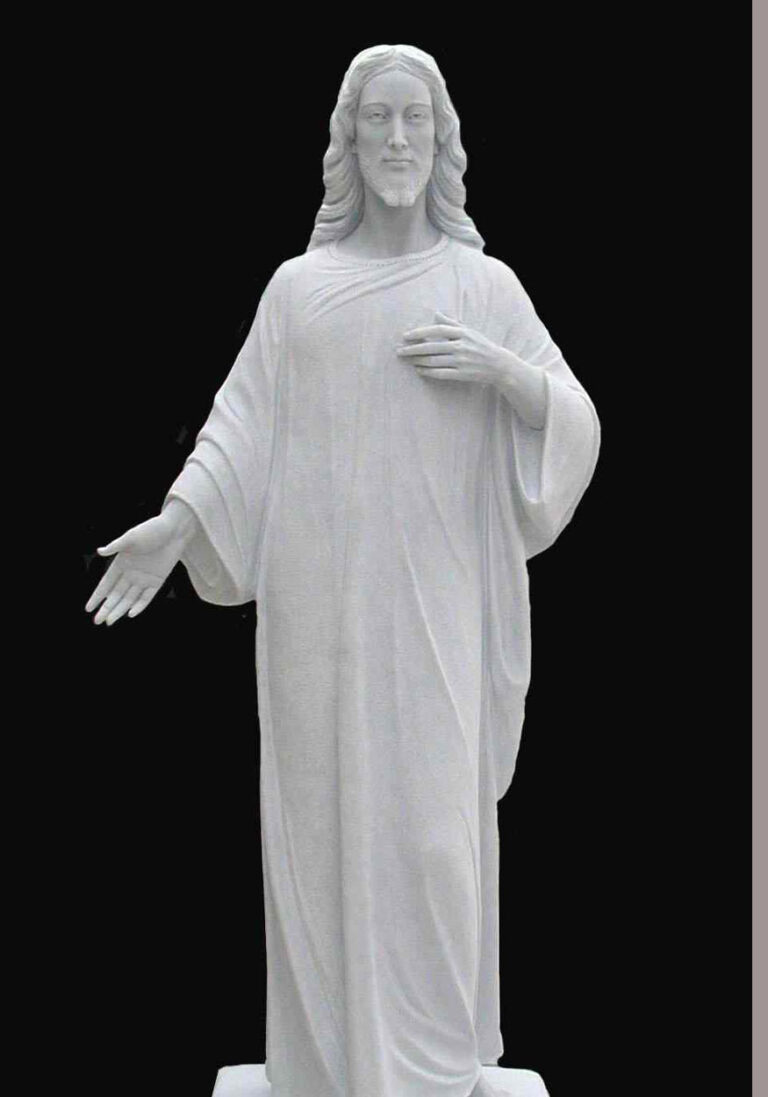 A white marble statue of Jesus with outstretched arms and flowing robes, exuding serenity and grace, displayed against a black background.